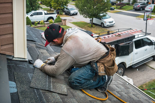 Professional Roof Replacement technician working in Botsford, CT